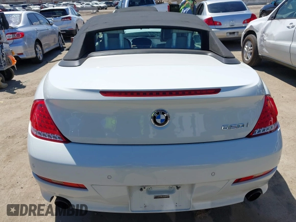 2009 BMW 6 Series 650i z VIN WBAEB53579CX64649, wystawiony jako IAAI lot #41937705 z przebiegiem 136 164 mil mil oraz . Historia ofert i sprzedaży dostępna na DreamBid. Obrazek 17.