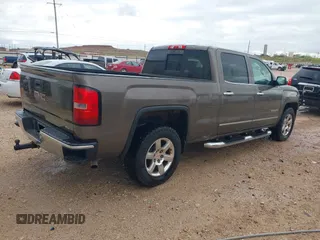 2015 GMC Sierra 1500 SLT with VIN 3GTU2VEC9FG173158, listed as a IAAI auction lot 41934631 with 207,226 mi miles and . Bid and sale history available at DreamBid. Image 4.
