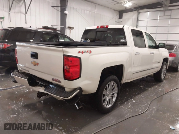2014 Chevrolet Silverado 1500 High Country with VIN 3GCUKTEC4EG527722, listed as a IAAI auction lot 41978841 with 104,492 mi miles and . Bid and sale history available at DreamBid. Image 4.
