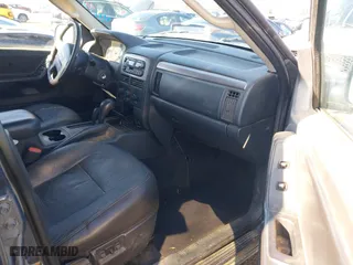 2002 Jeep Grand Cherokee Laredo with VIN 1J4GW48N72C261741, listed as a IAAI auction lot 40972222 with 174,516 mi miles. Bid and sale history available at carsss.com. Image 5.