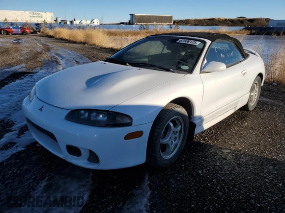 1999 Mitsubishi Eclipse GS with VIN 4A3AX35G2XE062629, listed as a Copart auction lot 87689125 with 223,210 mi miles and Salvage Title. Bid and sale history available at carsss.com. Image 2.