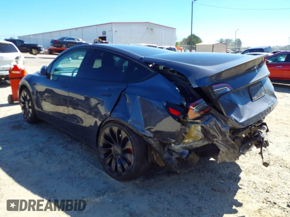 2022 Tesla Model Y Performance with VIN 7SAYGDEF9NF544205, listed as a IAAI auction lot 41825453 with 33,039 mi miles and . Bid and sale history available at DreamBid. Image 3.