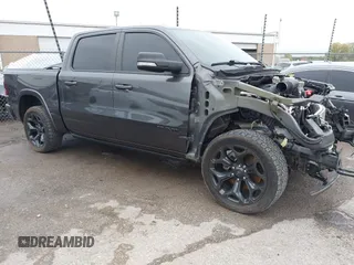 2022 Ram 1500 Limited z VIN 1C6SRFHTXNN100494, wystawiony jako IAAI lot #40805907 z przebiegiem 76 653 mil mil oraz . Historia ofert i sprzedaży dostępna na DreamBid. Obrazek 1.