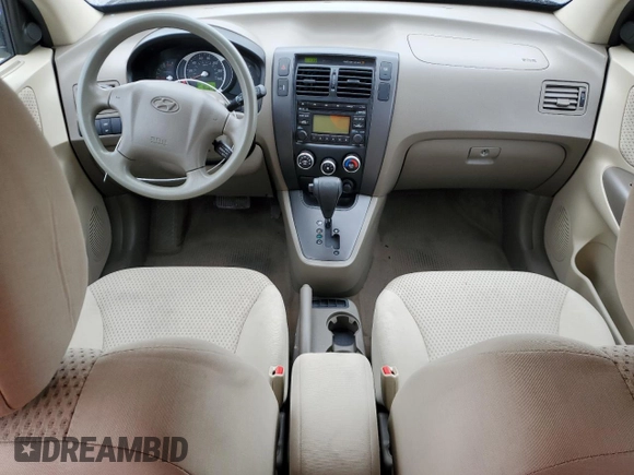 2009 Hyundai Tucson GLS with VIN KM8JM12B79U042597, listed as a Copart auction lot 52164465 with 90,943 mi miles and Salvage Title. Bid and sale history available at carsss.com. Image 8.