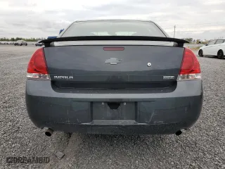 2013 Chevrolet Impala Police with VIN 2G1WD5E39D1166003, listed as a Copart auction lot 72040314 with 115,756 mi miles and Salvage Title. Bid and sale history available at carsss.com. Image 6.