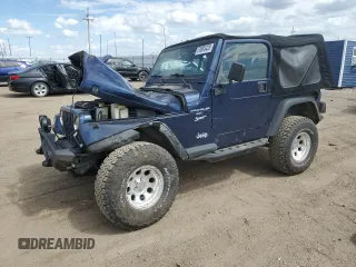 2002 Jeep Wrangler Sport z VIN 1J4FA49SX2P772609, wystawiony jako Copart lot #55893425 z przebiegiem 157 653 mil mil oraz Szkoda całkowita • Salvage title. Historia ofert i sprzedaży dostępna na DreamBid. Obrazek 1.