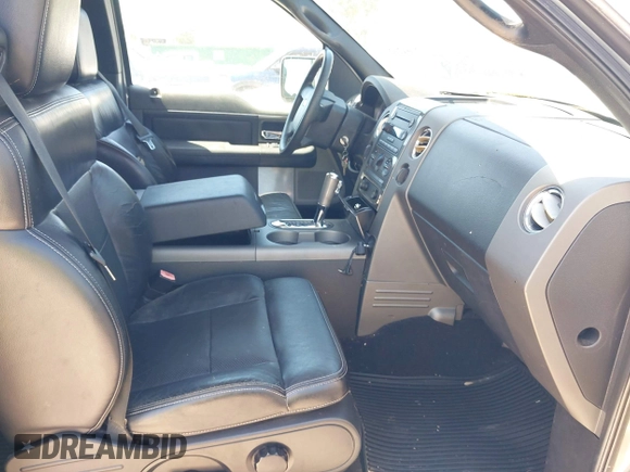 2005 Ford F-150 XLT with VIN 1FTPX14565KC84798, listed as a IAAI auction lot 42064262 with 149,534 mi miles. Bid and sale history available at carsss.com. Image 5.