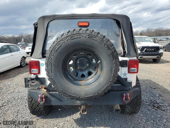 2010 Jeep Wrangler Mountain with VIN 1J4AA2D17AL145255, listed as a Copart auction lot 50129645 with 82,003 mi miles and Clean Title. Bid and sale history available at carsss.com. Image 6.