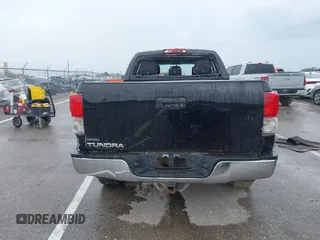 2012 Toyota Tundra z VIN 5TFRM5F15CX040630, wystawiony jako IAAI lot #42213728 z przebiegiem 242 469 mil mil oraz . Historia ofert i sprzedaży dostępna na DreamBid. Obrazek 15.