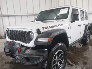 2024 Jeep Wrangler Rubicon with VIN 1C4PJXFG7RW334190, listed as a IAAI auction lot 42332948 with 14,272 mi miles and . Bid and sale history available at DreamBid. Image 2.