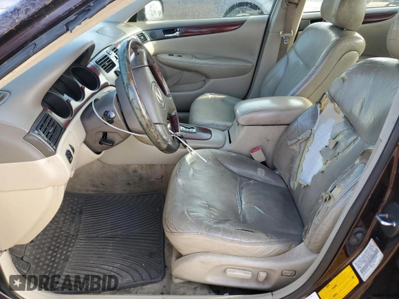 2002 Lexus ES 300 z VIN JTHBF30G620069802, wystawiony jako Copart lot #56731245 z przebiegiem 245 280 mil mil oraz Szkoda całkowita • Salvage title. Historia ofert i sprzedaży dostępna na DreamBid. Obrazek 7.