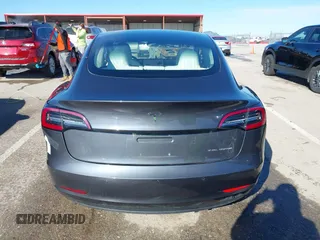 2018 Tesla Model 3 Long Range Battery with VIN 5YJ3E1EB6JF122167, listed as a IAAI auction lot 41761710 with 76,199 mi miles and . Bid and sale history available at DreamBid. Image 16.