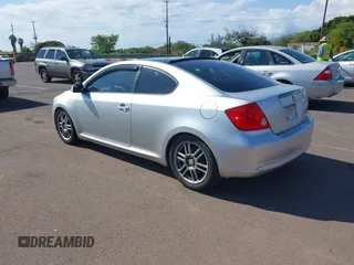 2006 Scion tC with VIN JTKDE177X60088987, listed as a IAAI auction lot 41893922 with 153,282 mi miles. Bid and sale history available at carsss.com. Image 3.