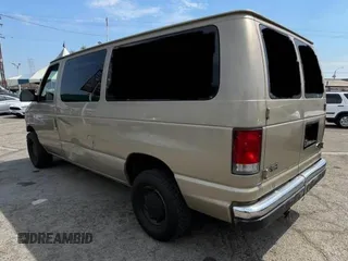 1999 Ford Econoline Passenger XL with VIN 1FMRE11L6XHB70992, listed as a Copart auction lot 78546004 with 264,378 mi miles and Clean title. Bid and sale history available at DreamBid. Image 3.