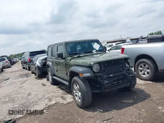 2021 Jeep Wrangler Unlimited Sport S z VIN 1C4HJXDG0MW510836, wystawiony jako IAAI lot #42072748 z przebiegiem 87 960 mil mil oraz . Historia ofert i sprzedaży dostępna na DreamBid. Obrazek 1.