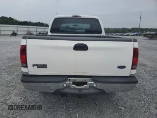 2000 Ford Super Duty F-250 XL with VIN 1FTNW21S1YED90136, listed as a Copart auction lot 71520914 with 378,931 mi miles and Salvage Title. Bid and sale history available at carsss.com. Image 6.