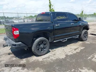 2014 Toyota Tundra Platinum with VIN 5TFAW5F15EX354983, listed as a IAAI auction lot 42392023 with 225,580 mi miles and . Bid and sale history available at DreamBid. Image 4.