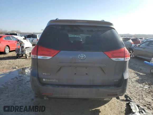 2014 Toyota Sienna XLE with VIN 5TDYK3DC5ES431148, listed as a Copart auction lot 43571065 with 82,854 mi miles and Salvage Title. Bid and sale history available at carsss.com. Image 6.
