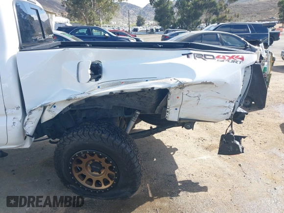 2018 Toyota Tacoma SR5 with VIN 3TMDZ5BN2JM037580, listed as a IAAI auction lot 42248418 with 35,661 mi miles and . Bid and sale history available at DreamBid. Image 6.