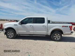 2019 Ford F-150 XL with VIN 1FTEW1E42KKE77610, listed as a IAAI auction lot 41765076 with 155,437 mi miles and . Bid and sale history available at DreamBid. Image 14.