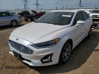 2019 Ford Fusion Hybrid Titanium with VIN 3FA6P0RU2KR255771, listed as a Copart auction lot 58183712 with 59,988 mi miles. Bid and sale history available at carsss.com. Image 2.
