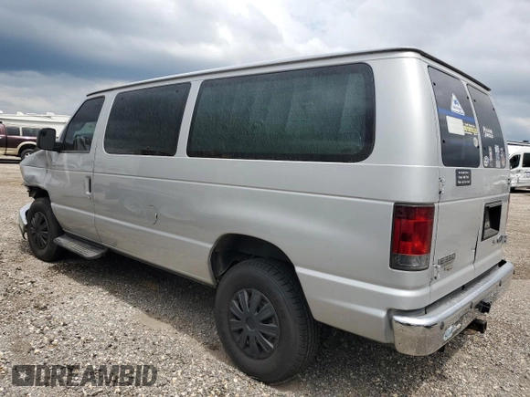 2011 Ford Econoline Passenger XL with VIN 1FBNE3BL8BDA53030, listed as a Copart auction lot 69919024 with 196,386 mi miles and Salvage Title. Bid and sale history available at DreamBid. Image 2.