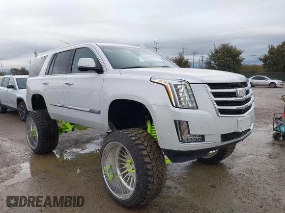 2020 Cadillac Escalade Luxury z VIN 1GYS3BKJ6LR124477, wystawiony jako IAAI lot #41471894 z przebiegiem 42 439 mil mil oraz . Historia ofert i sprzedaży dostępna na DreamBid. Obrazek 1.