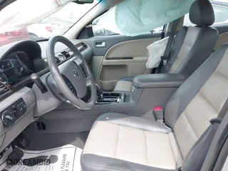 2009 Mercury Sable Premier with VIN 1MEHM42W49G631949, listed as a IAAI auction lot 41867802 with 138,208 mi miles. Bid and sale history available at carsss.com. Image 5.
