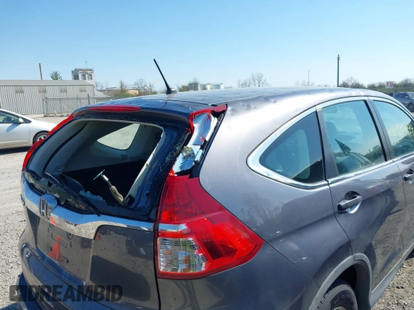 2015 Honda CR-V LX with VIN 2HKRM3H31FH557779, listed as a IAAI auction lot 42098299 with 211,683 mi miles and . Bid and sale history available at carsss.com. Image 21.