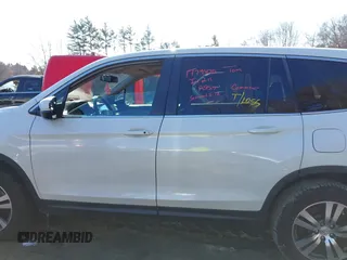 2016 Honda Pilot EX-L with VIN 5FNYF6H50GB073384, listed as a IAAI auction lot 41639667 with 99,267 mi miles. Bid and sale history available at carsss.com. Image 14.