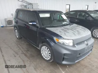 2014 Scion xB with VIN JTLZE4FE6EJ065251, listed as a IAAI auction lot 41465591 with 229,562 mi miles. Bid and sale history available at carsss.com. Image 1.