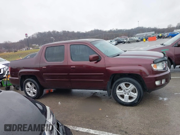2009 Honda Ridgeline RTL with VIN 5FPYK16529B100032, listed as a IAAI auction lot 41206781 with 130,694 mi miles and . Bid and sale history available at DreamBid. Image 13.