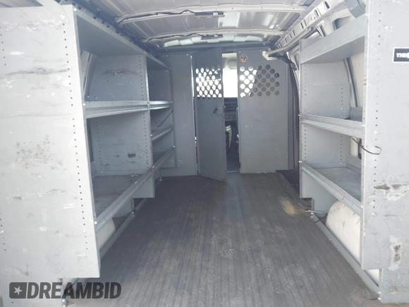2016 Chevrolet Express Cargo Van with VIN 1GCWGAFF0G1323959, listed as a IAAI auction lot 42172260 with 211,384 mi miles. Bid and sale history available at carsss.com. Image 8.