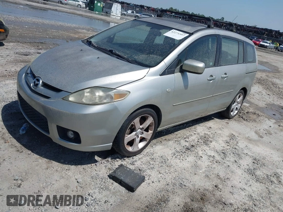 2007 Mazda 5 Touring with VIN JM1CR293970132132, listed as a IAAI auction lot 42275357 with 152,683 mi miles and . Bid and sale history available at DreamBid. Image 2.