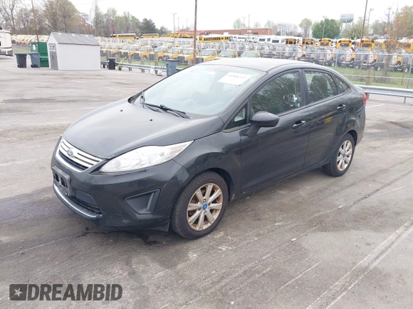 2011 Ford Fiesta SE with VIN 3FADP4BJ5BM221349, listed as a IAAI auction lot 41948737 with 216,540 mi miles. Bid and sale history available at carsss.com. Image 2.