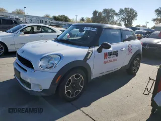 2014 MINI Paceman S with VIN WMWSS5C56EWN66690, listed as a Copart auction lot 81518424 with 129,845 mi miles and Salvage Title. Bid and sale history available at DreamBid. Image 1.