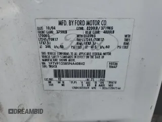 2005 Ford F-150 XL with VIN 1FTVF12585NA40842, listed as a Copart auction lot 61728465 with 288,002 mi miles and Salvage title. Bid and sale history available at DreamBid. Image 12.