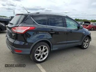 2016 Ford Escape Titanium с VIN 1FMCU9J93GUB78356, выставлен на аукционе Copart как лот 64264715 с пробегом 95 775 миль миль и Списание • Salvage title. История ставок и продаж доступна на DreamBid. Изображение 3.