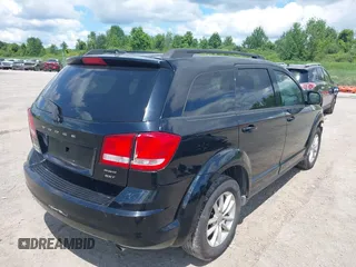 2017 Dodge Journey SXT z VIN 3C4PDDBG8HT512575, wystawiony jako IAAI lot #39710775 z przebiegiem 132 987 mil mil oraz . Historia ofert i sprzedaży dostępna na DreamBid. Obrazek 4.