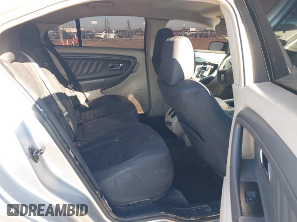 2011 Ford Taurus SE with VIN 1FAHP2DWXBG172965, listed as a IAAI auction lot 41395638 with 147,098 mi miles. Bid and sale history available at carsss.com. Image 8.