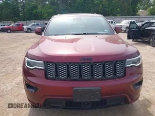 2021 Jeep Grand Cherokee Laredo X with VIN 1C4RJEAG0MC539722, listed as a IAAI auction lot 42059140 with 63,582 mi miles and . Bid and sale history available at DreamBid. Image 12.