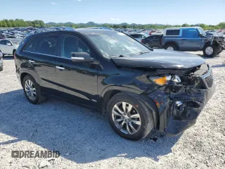 2012 Kia Sorento SX with VIN 5XYKWDA28CG300110, listed as a Copart auction lot 57994995 with 120,228 mi miles and Salvage title. Bid and sale history available at DreamBid. Image 4.