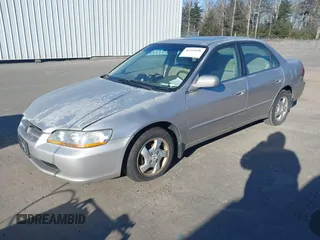1998 Honda Accord EX z VIN 1HGCG6674WA107380, wystawiony jako IAAI lot #41265496 z przebiegiem 161 006 mil mil oraz . Historia ofert i sprzedaży dostępna na DreamBid. Obrazek 2.