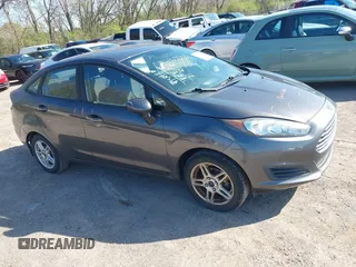 2017 Ford Fiesta SE with VIN 3FADP4BJ0HM117117, listed as a IAAI auction lot 41983052 with 99,186 mi miles. Bid and sale history available at carsss.com. Image 1.