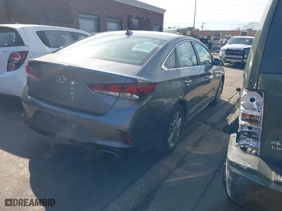2019 Hyundai Sonata Sport with VIN 5NPE34AF5KH815856, listed as a IAAI auction lot 41687468 with 59,030 mi miles. Bid and sale history available at carsss.com. Image 4.