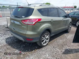 2014 Ford Escape Titanium с VIN 1FMCU0J93EUA92621, выставлен на аукционе IAAI как лот 42531195 с пробегом 170 423 миль миль и . История ставок и продаж доступна на DreamBid. Изображение 4.