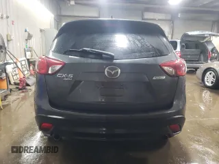 2014 Mazda CX-5 Sport z VIN JM3KE4BE2E0371864, wystawiony jako Copart lot #47225335 z przebiegiem 157 483 mil mil oraz Szkoda całkowita • Salvage title. Historia ofert i sprzedaży dostępna na DreamBid. Obrazek 6.