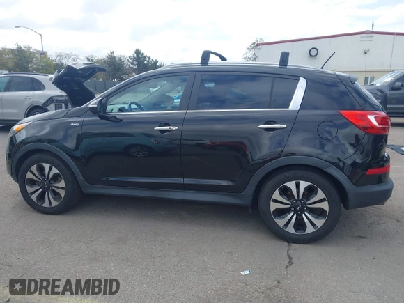 2013 Kia Sportage SX with VIN KNDPCCA61D7385219, listed as a IAAI auction lot 41945345 with 112,471 mi miles and . Bid and sale history available at carsss.com. Image 14.