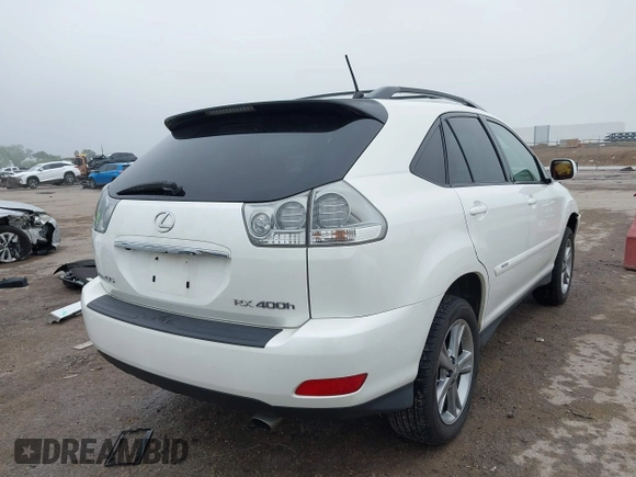 2007 Lexus RX 400h z VIN JTJGW31U572003651, wystawiony jako IAAI lot #42163515 z przebiegiem 358 648 mil mil oraz . Historia ofert i sprzedaży dostępna na DreamBid. Obrazek 4.