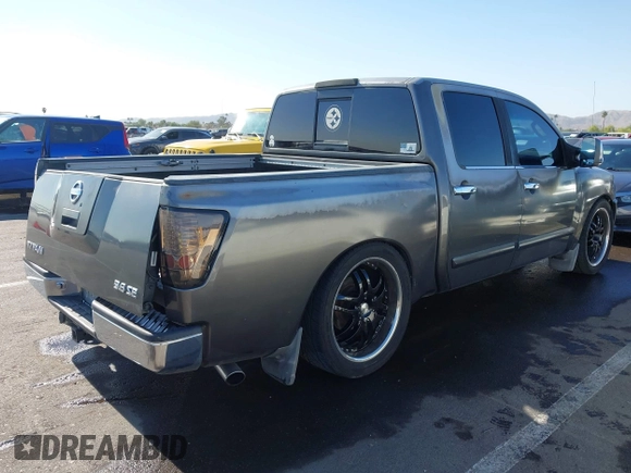 2004 Nissan Titan LE with VIN 1N6AA07A14N541998, listed as a IAAI auction lot 42304039 with 189,533 mi miles and . Bid and sale history available at DreamBid. Image 4.